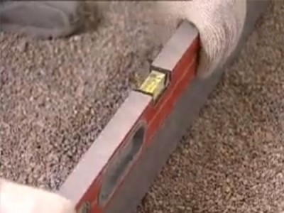 Подготовка основания под бетонный пол: проверка уровня пола